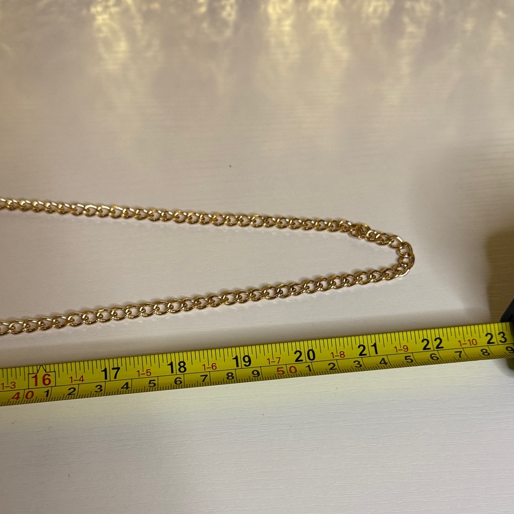 Tan Round Cork Crossbody with a wooden beaded top handle and gold tone chain - Picture 8 of 9